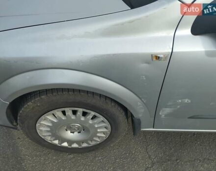 Серый Опель Астра, объемом двигателя 1.4 л и пробегом 202 тыс. км за 4200 $, фото 3 на Automoto.ua