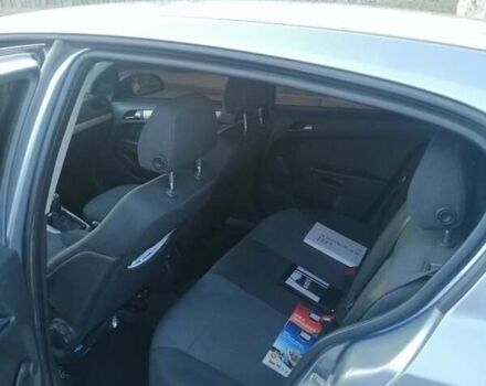 Серый Опель Астра, объемом двигателя 1.4 л и пробегом 260 тыс. км за 5099 $, фото 2 на Automoto.ua