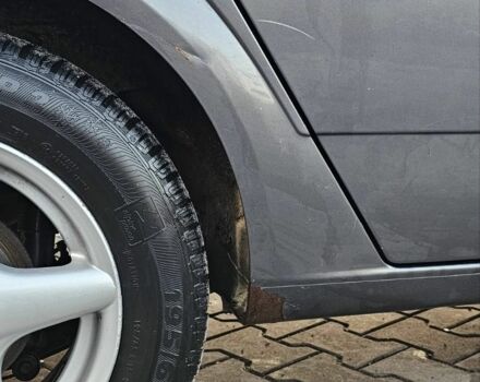 Серый Опель Астра, объемом двигателя 1.4 л и пробегом 191 тыс. км за 3700 $, фото 4 на Automoto.ua