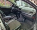 Серый Опель Астра, объемом двигателя 1.6 л и пробегом 246 тыс. км за 6200 $, фото 6 на Automoto.ua
