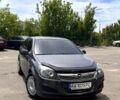 Серый Опель Астра, объемом двигателя 1.4 л и пробегом 207 тыс. км за 6000 $, фото 1 на Automoto.ua