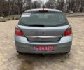 Серый Опель Астра, объемом двигателя 1.4 л и пробегом 205 тыс. км за 4400 $, фото 6 на Automoto.ua