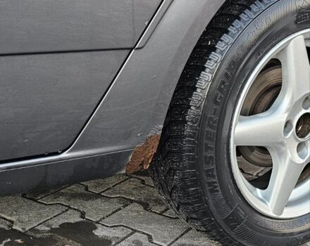 Серый Опель Астра, объемом двигателя 1.4 л и пробегом 191 тыс. км за 3700 $, фото 3 на Automoto.ua