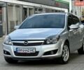 Сірий Опель Астра, об'ємом двигуна 1.8 л та пробігом 59 тис. км за 6777 $, фото 10 на Automoto.ua