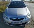 Серый Опель Астра, объемом двигателя 1.4 л и пробегом 246 тыс. км за 5950 $, фото 1 на Automoto.ua