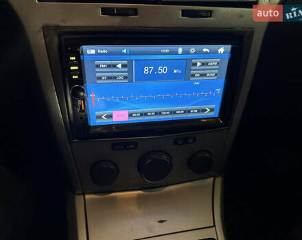 Серый Опель Астра, объемом двигателя 1.25 л и пробегом 303 тыс. км за 3500 $, фото 17 на Automoto.ua