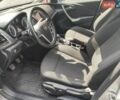 Серый Опель Астра, объемом двигателя 1.4 л и пробегом 171 тыс. км за 7700 $, фото 8 на Automoto.ua