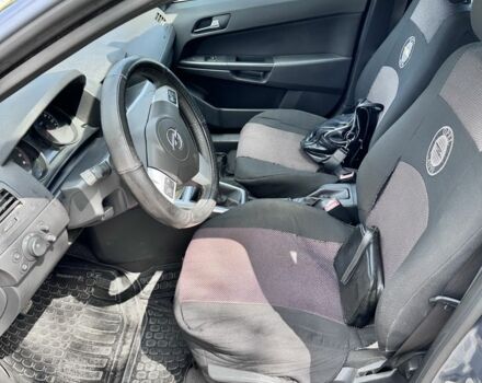 Серый Опель Астра, объемом двигателя 1.6 л и пробегом 30 тыс. км за 7500 $, фото 9 на Automoto.ua