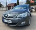 Серый Опель Астра, объемом двигателя 1.4 л и пробегом 212 тыс. км за 6400 $, фото 3 на Automoto.ua