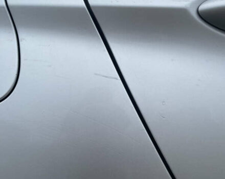 Серый Опель Астра, объемом двигателя 1.4 л и пробегом 160 тыс. км за 10000 $, фото 13 на Automoto.ua