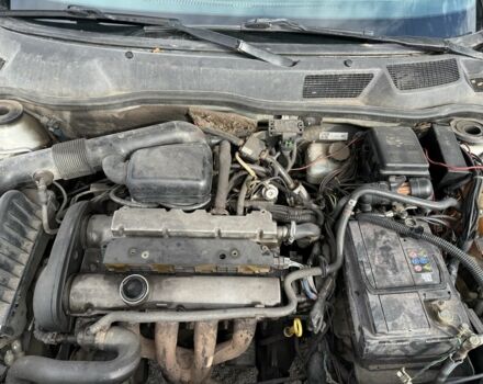 Серый Опель Астра, объемом двигателя 1.6 л и пробегом 333 тыс. км за 1450 $, фото 10 на Automoto.ua