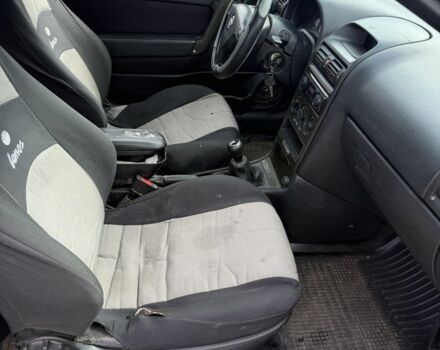 Серый Опель Астра, объемом двигателя 1.6 л и пробегом 333 тыс. км за 1450 $, фото 8 на Automoto.ua