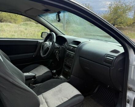 Серый Опель Астра, объемом двигателя 1.6 л и пробегом 333 тыс. км за 1450 $, фото 7 на Automoto.ua