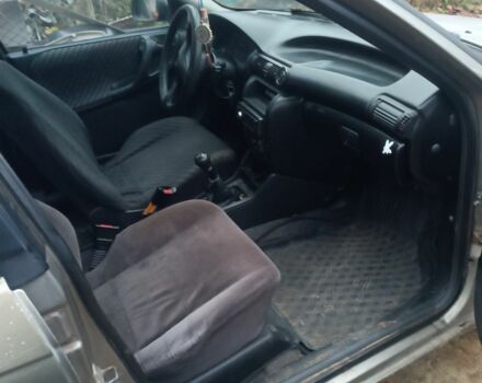 Серый Опель Астра, объемом двигателя 1.4 л и пробегом 280 тыс. км за 850 $, фото 5 на Automoto.ua