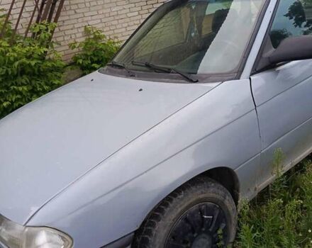 Серый Опель Астра, объемом двигателя 1.4 л и пробегом 185 тыс. км за 1400 $, фото 2 на Automoto.ua