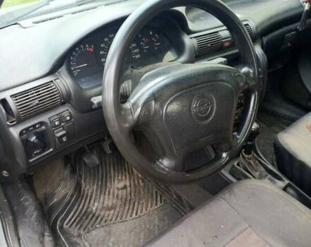 Серый Опель Астра, объемом двигателя 1.4 л и пробегом 185 тыс. км за 1400 $, фото 6 на Automoto.ua