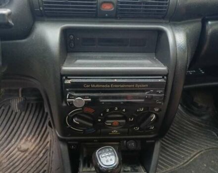 Серый Опель Астра, объемом двигателя 1.4 л и пробегом 185 тыс. км за 1400 $, фото 4 на Automoto.ua