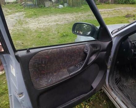 Серый Опель Астра, объемом двигателя 1.4 л и пробегом 185 тыс. км за 1400 $, фото 5 на Automoto.ua