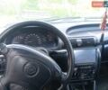 Сірий Опель Астра, об'ємом двигуна 1.4 л та пробігом 185 тис. км за 1100 $, фото 7 на Automoto.ua