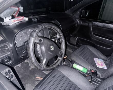 Сірий Опель Астра, об'ємом двигуна 2 л та пробігом 300 тис. км за 1900 $, фото 4 на Automoto.ua