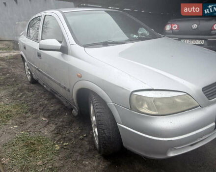 Серый Опель Астра, объемом двигателя 2 л и пробегом 300 тыс. км за 1900 $, фото 2 на Automoto.ua