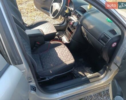 Серый Опель Астра, объемом двигателя 1.6 л и пробегом 275 тыс. км за 4200 $, фото 9 на Automoto.ua