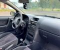 Серый Опель Астра, объемом двигателя 1.4 л и пробегом 200 тыс. км за 2399 $, фото 5 на Automoto.ua