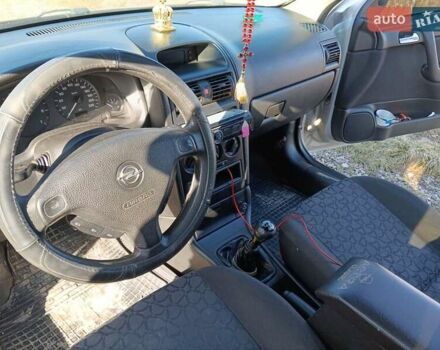 Серый Опель Астра, объемом двигателя 1.6 л и пробегом 275 тыс. км за 4200 $, фото 3 на Automoto.ua
