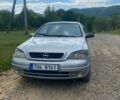 Серый Опель Астра, объемом двигателя 1.6 л и пробегом 318 тыс. км за 1200 $, фото 1 на Automoto.ua