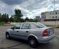 Серый Опель Астра, объемом двигателя 1.4 л и пробегом 200 тыс. км за 2399 $, фото 2 на Automoto.ua