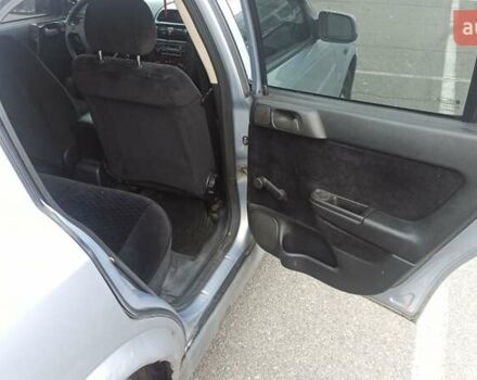 Серый Опель Астра, объемом двигателя 1.6 л и пробегом 235 тыс. км за 2500 $, фото 9 на Automoto.ua