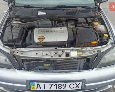 Серый Опель Астра, объемом двигателя 1.6 л и пробегом 235 тыс. км за 2500 $, фото 4 на Automoto.ua