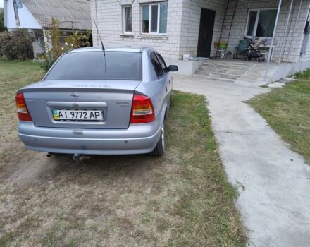 Серый Опель Астра, объемом двигателя 1.4 л и пробегом 234 тыс. км за 3500 $, фото 3 на Automoto.ua