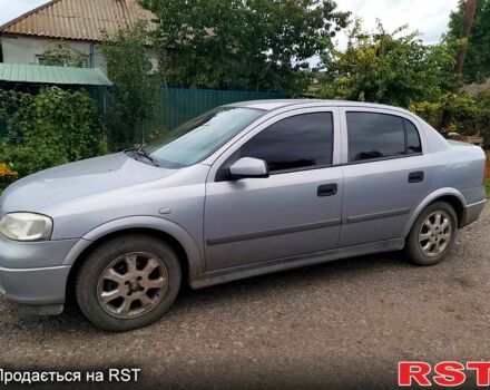 Серый Опель Астра, объемом двигателя 1.4 л и пробегом 174 тыс. км за 3000 $, фото 1 на Automoto.ua