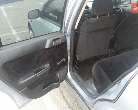 Серый Опель Астра, объемом двигателя 1.6 л и пробегом 235 тыс. км за 2500 $, фото 6 на Automoto.ua