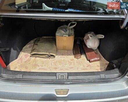 Серый Опель Астра, объемом двигателя 1.6 л и пробегом 206 тыс. км за 4000 $, фото 10 на Automoto.ua