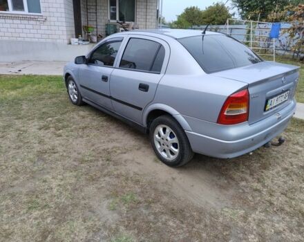 Серый Опель Астра, объемом двигателя 1.4 л и пробегом 234 тыс. км за 3500 $, фото 2 на Automoto.ua