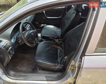 Серый Опель Астра, объемом двигателя 1.6 л и пробегом 206 тыс. км за 4000 $, фото 14 на Automoto.ua