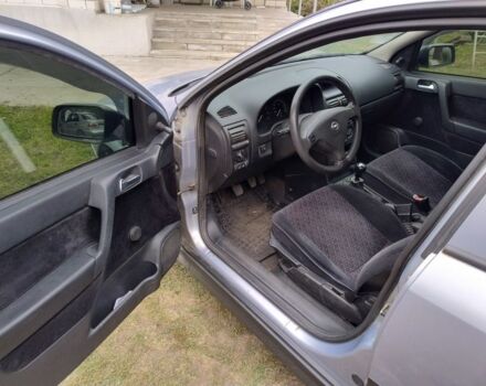 Серый Опель Астра, объемом двигателя 1.4 л и пробегом 234 тыс. км за 3500 $, фото 5 на Automoto.ua