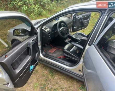 Сірий Опель Астра, об'ємом двигуна 2 л та пробігом 338 тис. км за 4650 $, фото 14 на Automoto.ua