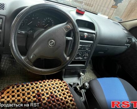 Серый Опель Астра, объемом двигателя 1.7 л и пробегом 250 тыс. км за 1750 $, фото 9 на Automoto.ua