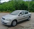 Серый Опель Астра, объемом двигателя 1.4 л и пробегом 260 тыс. км за 3900 $, фото 7 на Automoto.ua