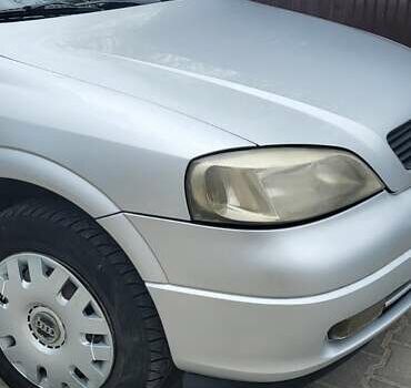 Серый Опель Астра, объемом двигателя 1.6 л и пробегом 248 тыс. км за 4000 $, фото 5 на Automoto.ua