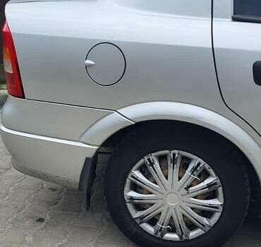 Серый Опель Астра, объемом двигателя 1.6 л и пробегом 248 тыс. км за 4000 $, фото 6 на Automoto.ua