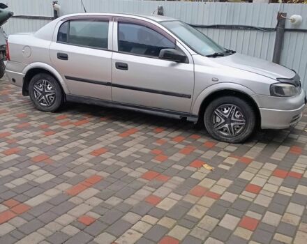 Серый Опель Астра, объемом двигателя 1.6 л и пробегом 236 тыс. км за 1500 $, фото 2 на Automoto.ua