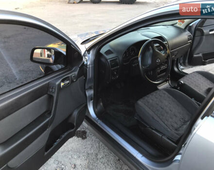 Серый Опель Астра, объемом двигателя 1.4 л и пробегом 254 тыс. км за 3500 $, фото 9 на Automoto.ua