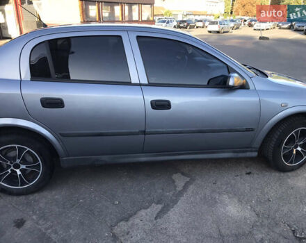 Серый Опель Астра, объемом двигателя 1.4 л и пробегом 254 тыс. км за 3500 $, фото 5 на Automoto.ua