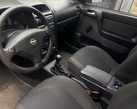 Серый Опель Астра, объемом двигателя 1.4 л и пробегом 310 тыс. км за 3200 $, фото 4 на Automoto.ua