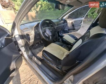 Сірий Опель Астра, об'ємом двигуна 1.6 л та пробігом 322 тис. км за 3100 $, фото 4 на Automoto.ua