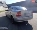 Серый Опель Астра, объемом двигателя 1.6 л и пробегом 430 тыс. км за 2500 $, фото 2 на Automoto.ua